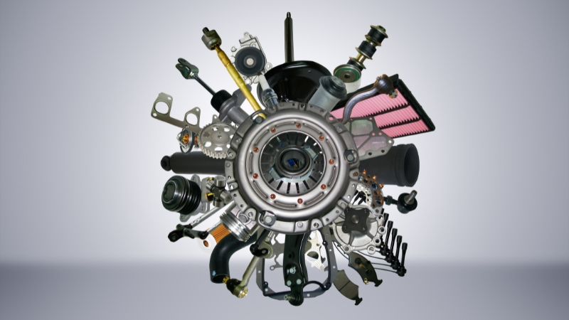 A variety of industrial spare parts arranged in a circular pattern, emphasizing the supply chain